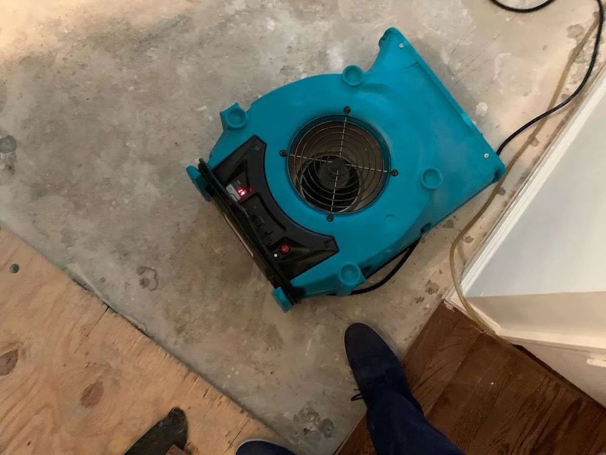 Air mover drying subfloor during Leak Detection & Repair in Wailuku